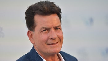 Charlie Sheen is 'single dad' to twins, follows John Travolta, Liam Neeson raising kids solo