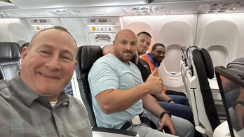 Smiling fugitive recaptured and returned to Kentucky after dramatic airport escape